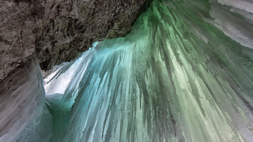Icicles hanging from frozen Panther Falls, Banff National Park, Alberta 