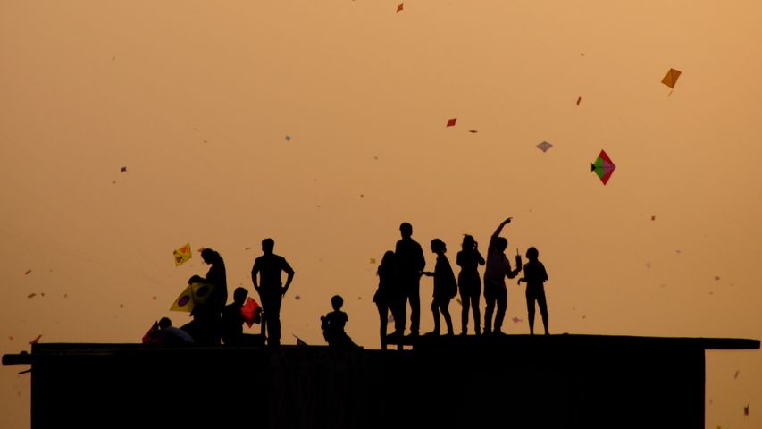 Kite flying in Ahmedabad during the last hour of Uttarayan