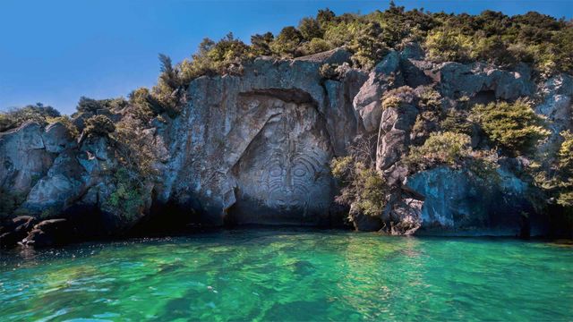 The Mine Bay Māori Rock Carving of Ngatoroirangi by Matahi Whakataka-Brightwell on Lake Taupo, North Island, New Zealand