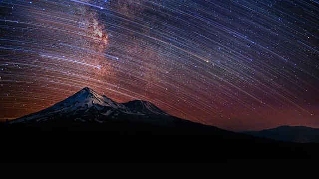 Star trails over Mount Shasta in California