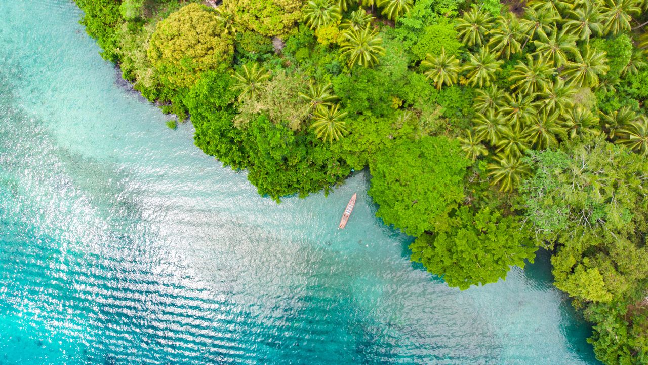 Blue lagoon of Pulau Ay, Banda Islands, Indonesia