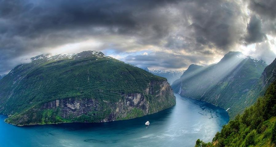 Geirangerfjord with cruise ship and The Seven Sisters waterfall on far right, Geiranger, Møre og Romsdal, Norway