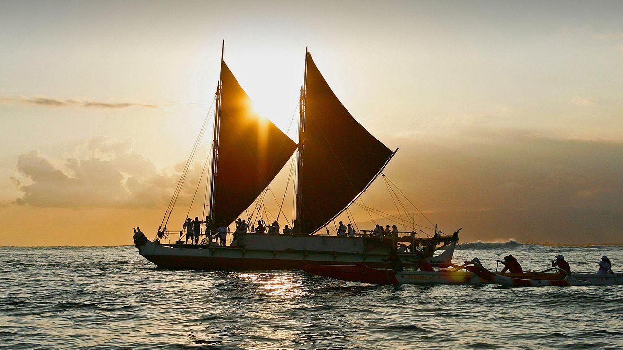 The Hōkūle'a, a traditional Hawaiian voyaging canoe, departs for a 3-year voyage from Honolulu, Hawaii, on May 17, 2014