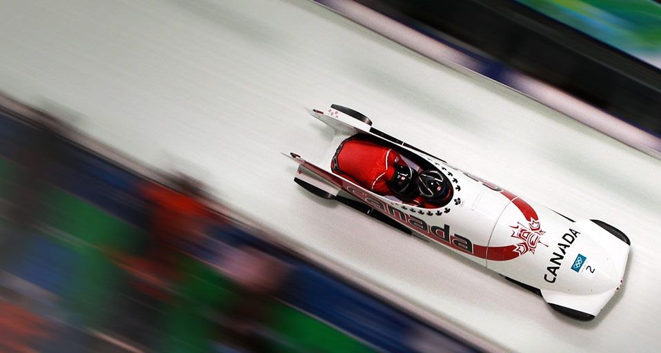 Kaillie Humphries and Heather Moyse of Canada compete in Canada 1 during the Women's Bobsleigh race at the 2010 Vancouver Winter Olympics on February 23, 2010