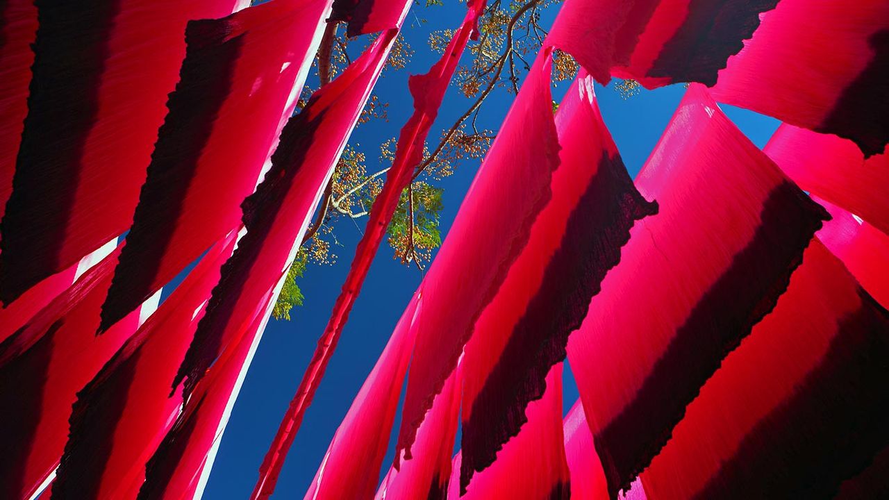 Dyed silk hanging to dry in Marrakech, Morocco 