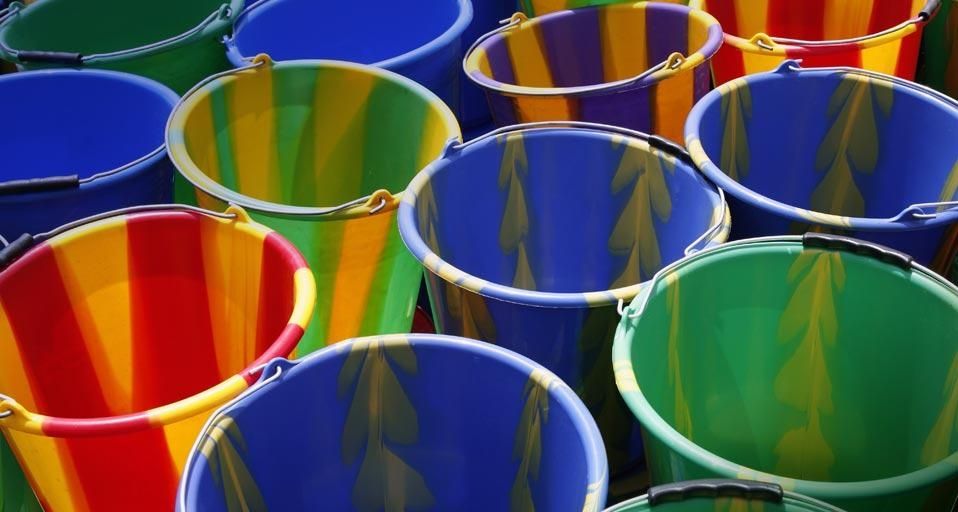 Multicolored buckets at a market in Loropéni, Burkina Faso
