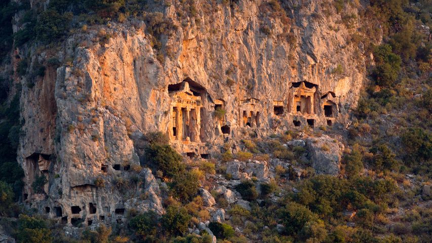 Ancient rock tombs carved into the cliff near Dalyan, Turkey