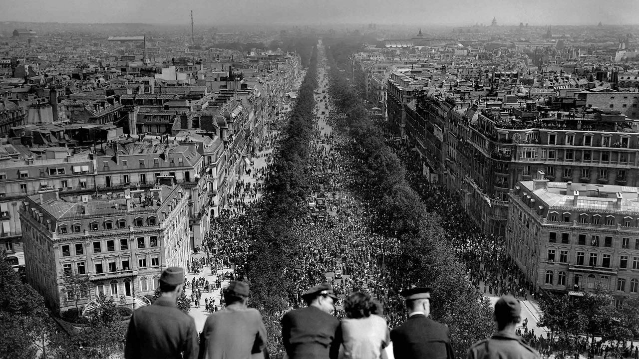Crowds on the Champs-Élysées on 8 May 1945, Paris, France