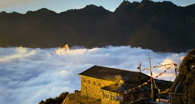 Lodge above the clouds at Thare Pati at sunset along the Helambu trekking circuit, Nepal