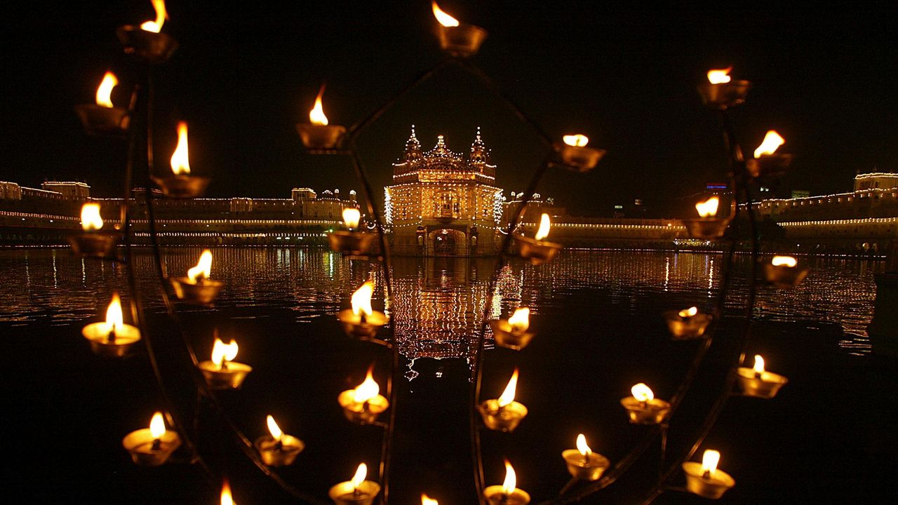Oil lamps on the birth anniversary of Sikh founder Guru Nanak Dev