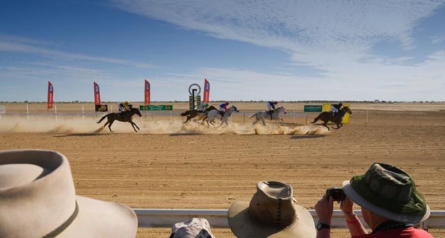Crowd watching Birdsville Cup horse race, Birdsville, Queensland, Australia