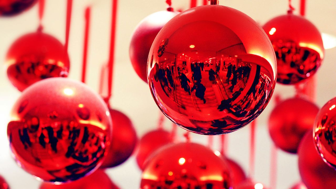 For Black Friday, shoppers reflected in ornaments