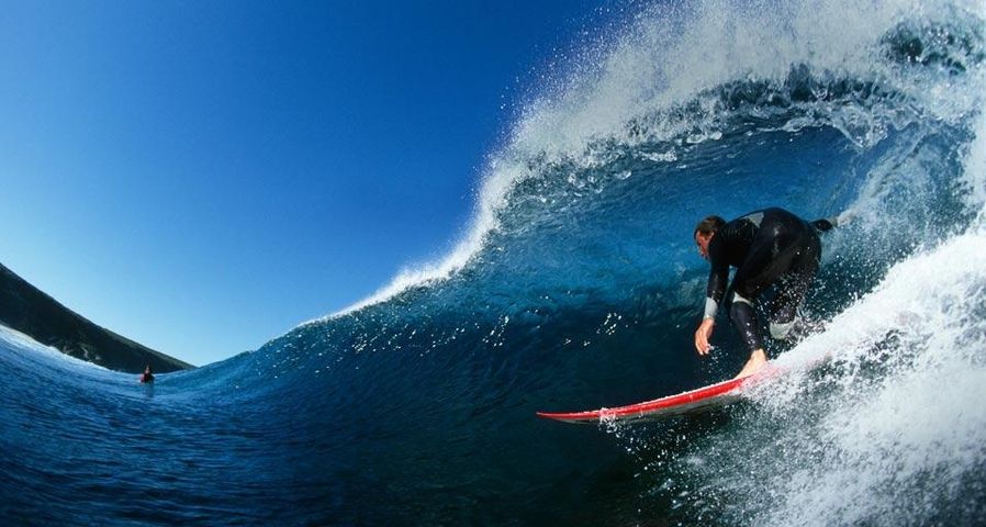 Side View of a Surfer Riding a Wave, Injidup Beach, Western Australia