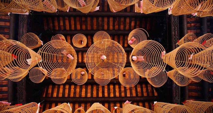 Spirals of incense hanging from the ceiling in Thien Hau Pagoda, in the Cholon (Chinatown) district of Ho Chi Minh City, Vietnam