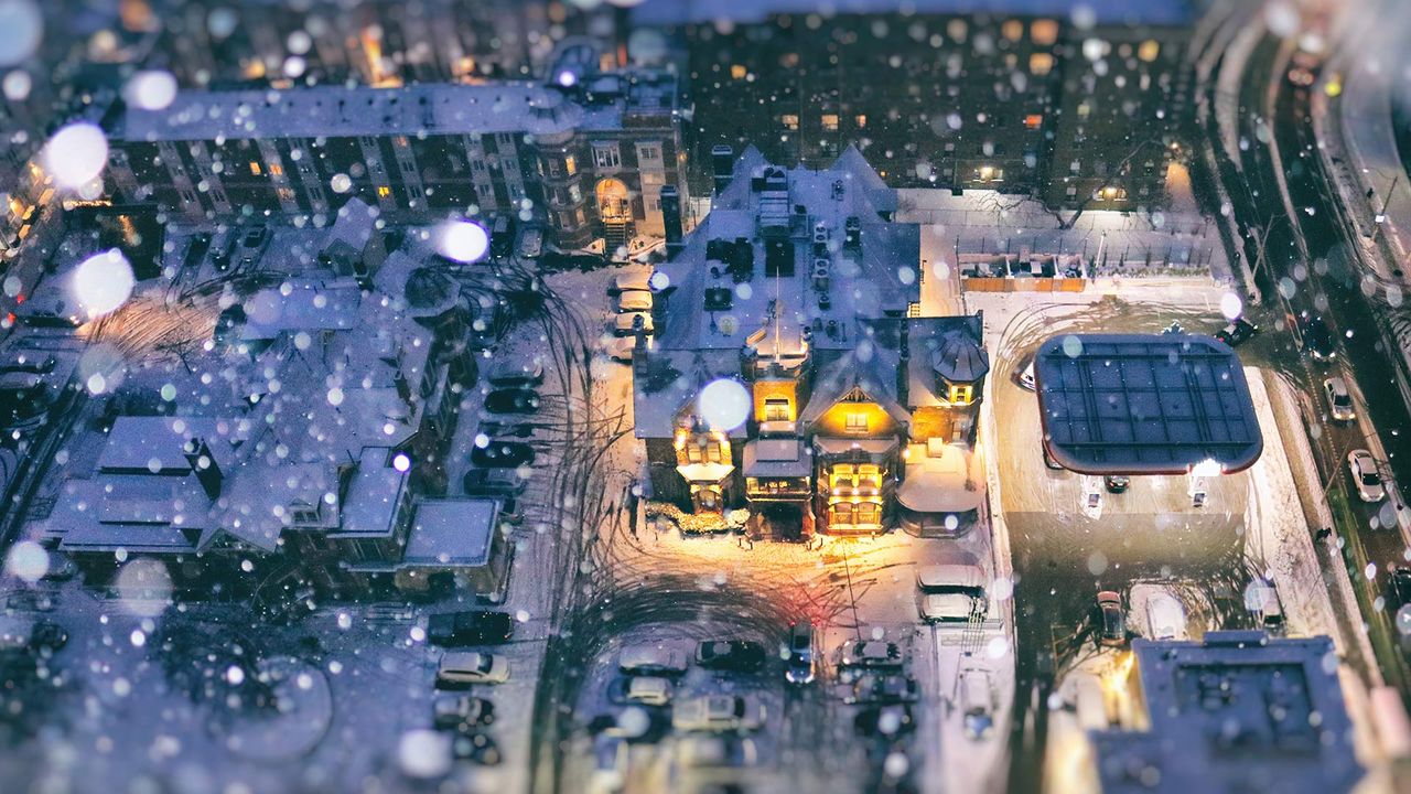 Aerial view of a residential area on a snow day during blue hour, Toronto