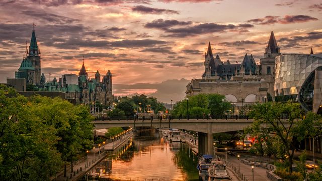 Rideau Canal at sunset with Chateau Laurier in the background, Ottawa 