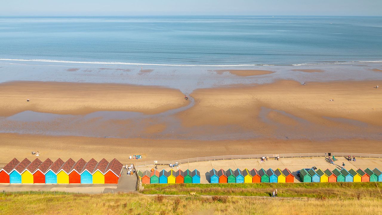 Beach huts on West Cliff Beach, Whitby, North Yorkshire
