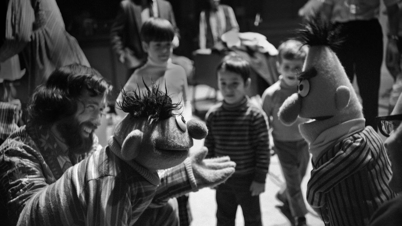 Jim Henson, along with Ernie and Bert, rehearses for an episode of 'Sesame Street' in 1970 in New York City