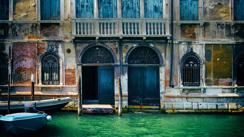 Building façade and canal in Venice, Italy