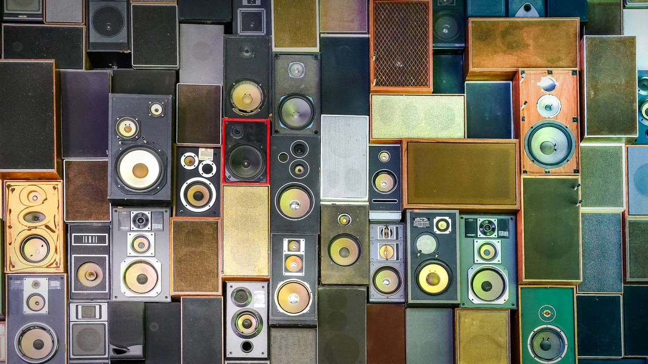 Retro music speakers hanging on a wall 