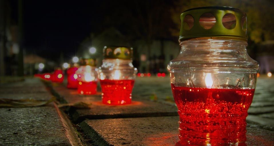 Candles lining a street for All Souls' Day in Kaunas, Lithuania