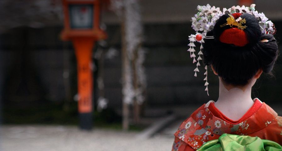 Geisha at temple in Kyoto