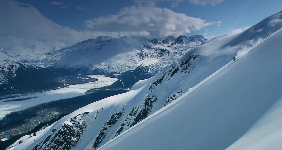 Skier making turns on a ridge near Valdez, Alaska