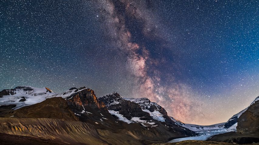 The Milky Way and galactic core area over Mount Andromeda (centre), Mount Athabasca (left) and the Athabasca Glacier (right) at the Columbia Icefields