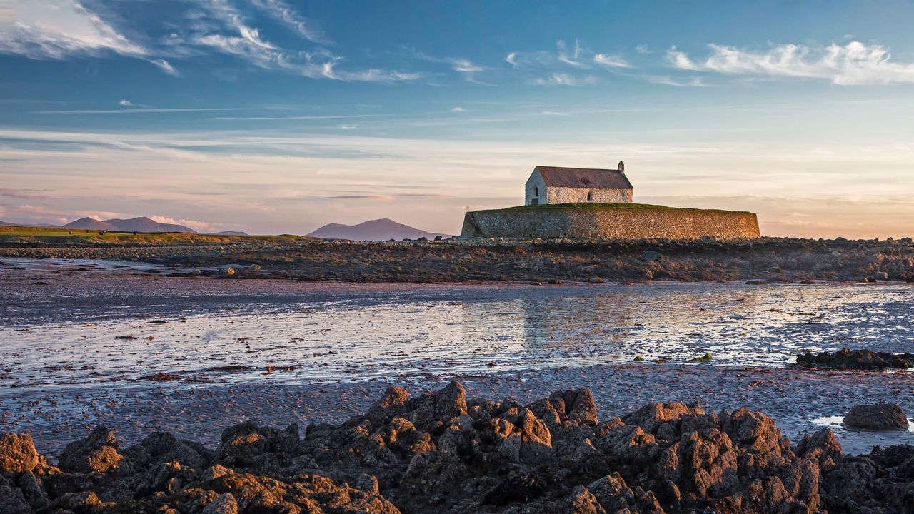 St Cwyfans Church, Anglesey at low tide.