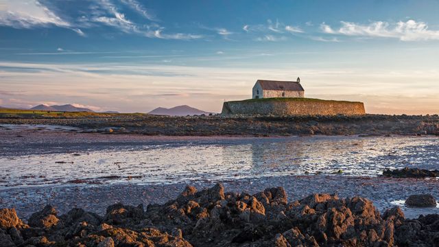 St Cwyfans Church, Anglesey at low tide.