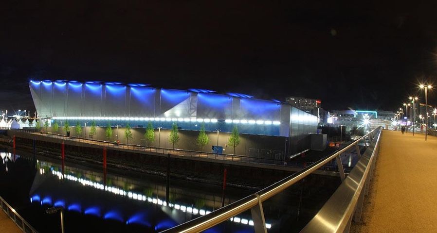 Night-time landscape view of the Water Polo Arena in Olympic Park, London