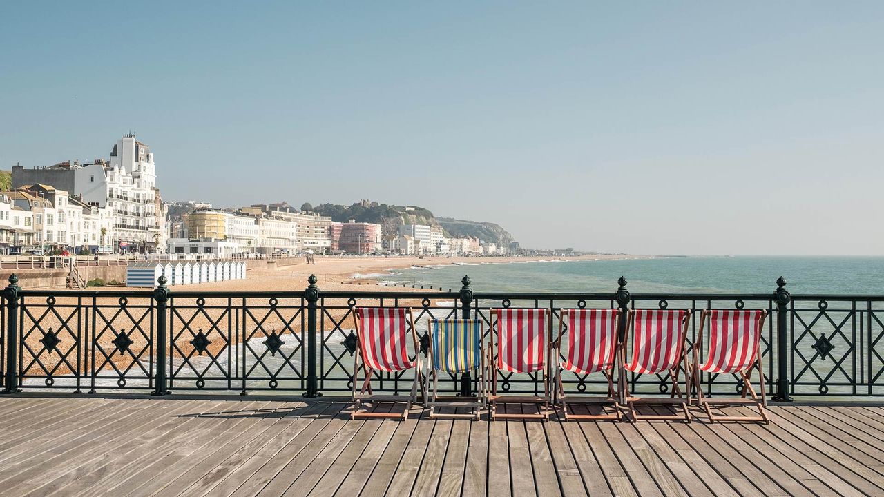 Deckchairs on Hastings Pier, East Sussex, England