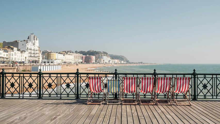 Deckchairs on Hastings Pier, East Sussex, England