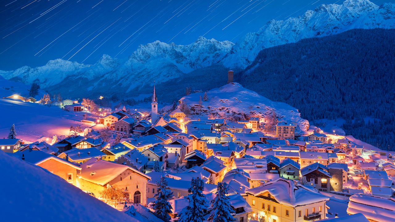 Star trails over Ardez village, Graubunden, Switzerland