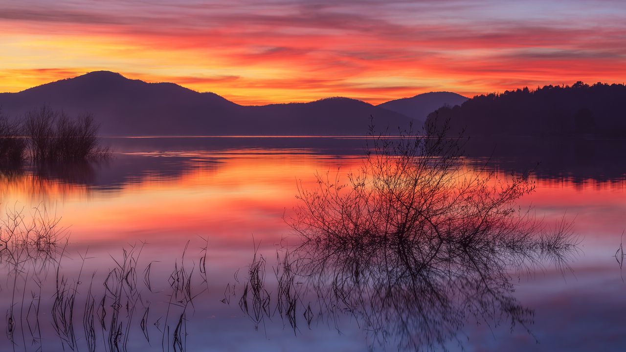 Sunset reflections, Ullíbarri-Gamboa Reservoir, Basque Country, Spain
