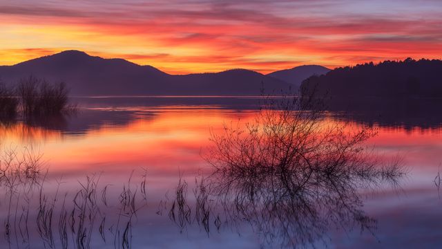 Sunset reflections, Ullíbarri-Gamboa Reservoir, Basque Country, Spain