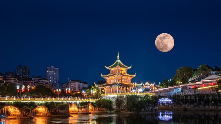 Jiaxiu Tower under a full moon, Guiyang, Guizhou province, China