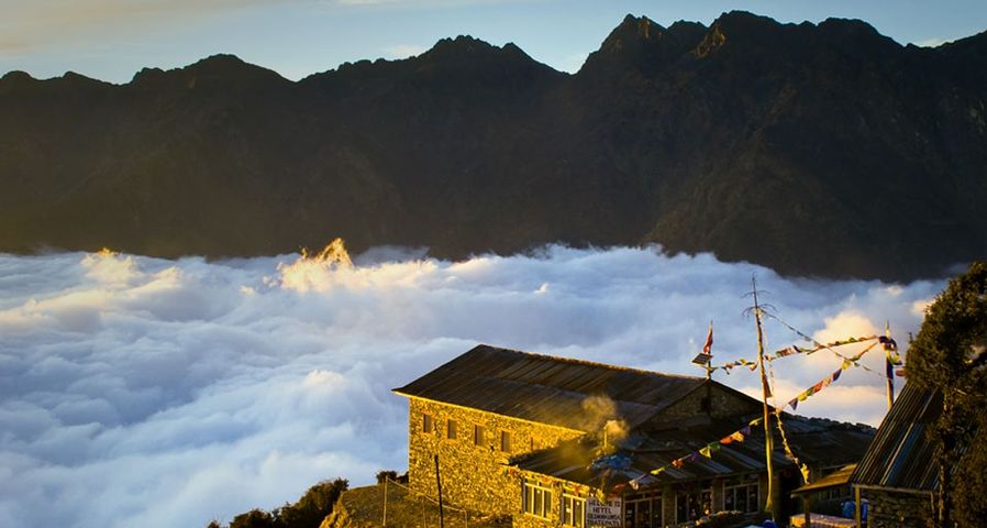 Lodge above the clouds at Thare Pati at sunset along the Helambu trekking circuit, Nepal