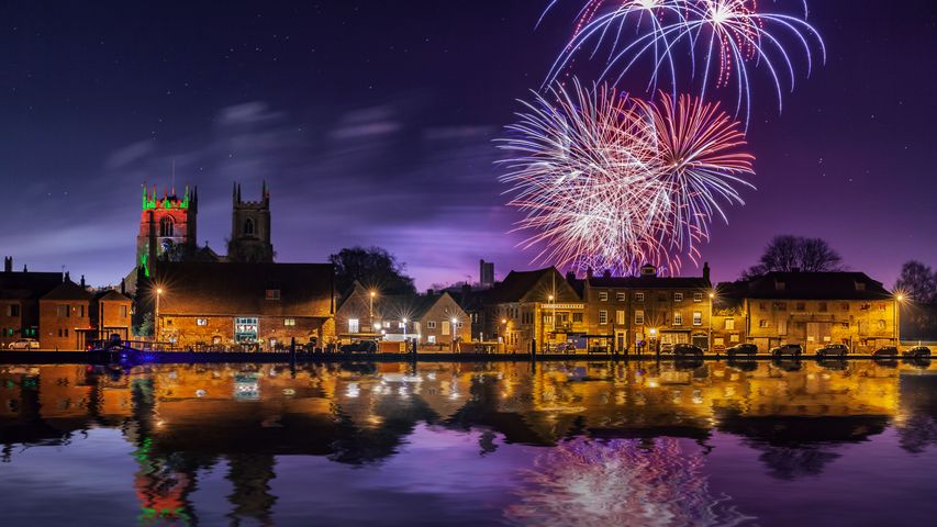 Fireworks exploding over the Great River Ouse, King's Lynn, Norfolk