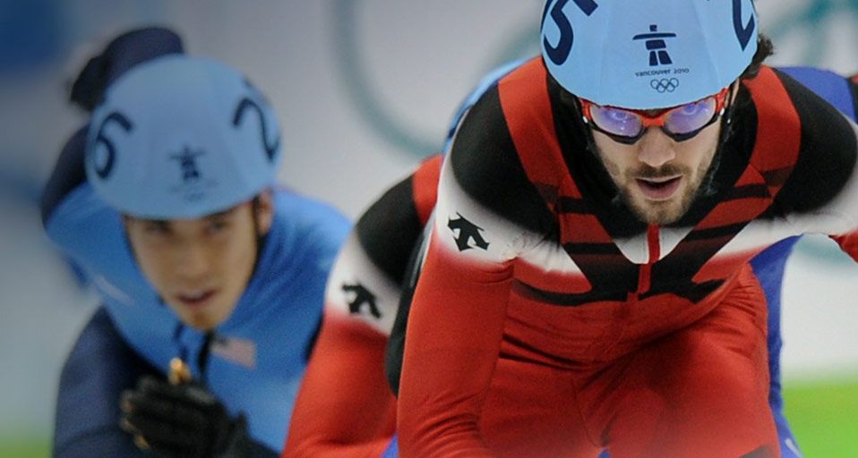 Gold medalist, Canada's Charles Hamelin (R) and Apolo Anton Ohno
