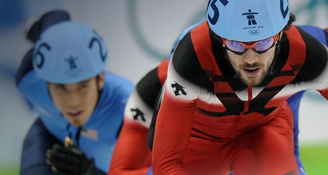 Gold medalist, Canada's Charles Hamelin (R) and Apolo Anton Ohno