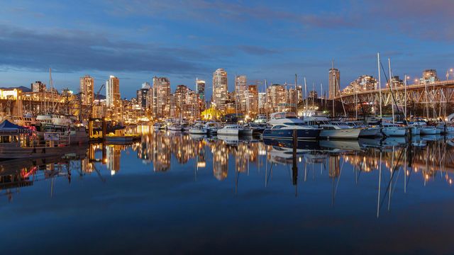 Boats resting between the Granville Bridge and the Burrard Bridge in False Creek, Vancouver