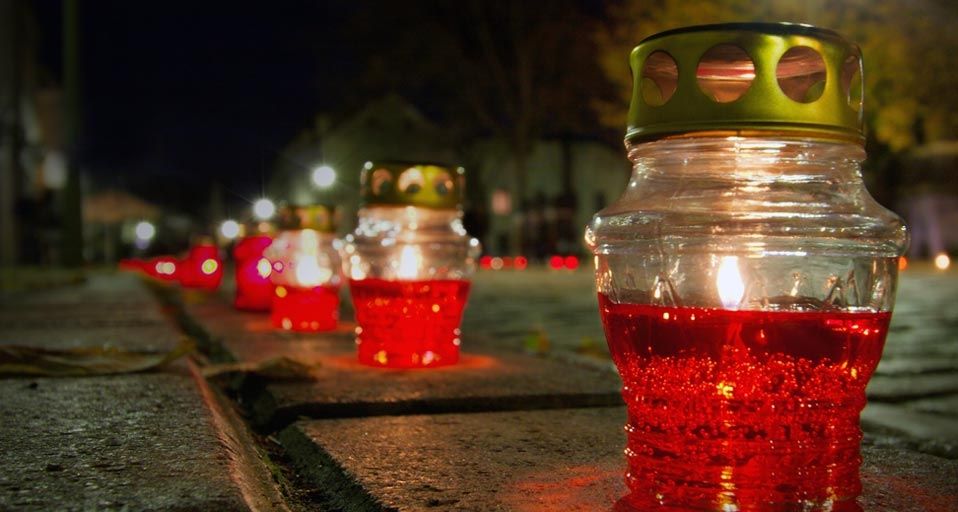 Candles lining a street for All Souls' Day in Kaunas, Lithuania