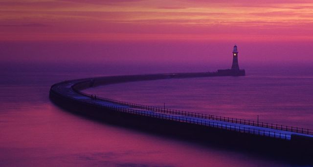 Winter sunrise over the beach at Roker Pier in Sunderland