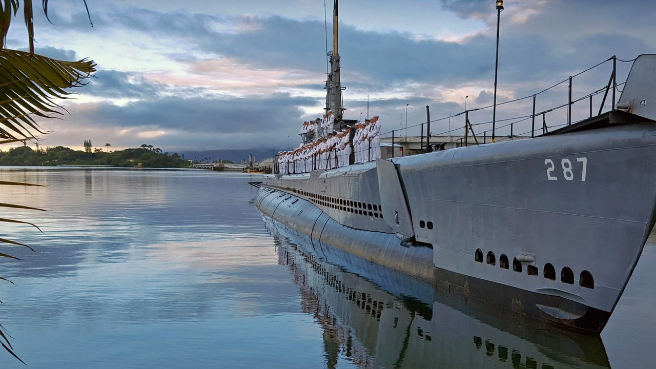 US Navy sailors on the WWII museum ship USS Bowfin in Honolulu, Hawaii