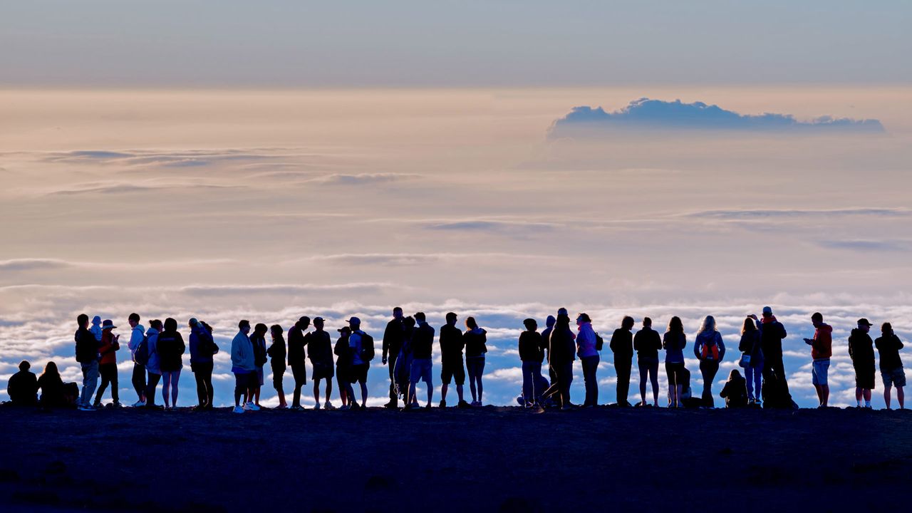 Visitors at the summit of Haleakalā at Haleakalā National Park, Hawaii 