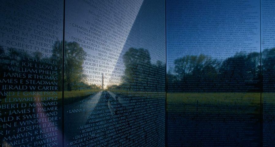 The Washington Monument reflected in the Vietnam Veterans Memorial Wall, Washington, D.C.