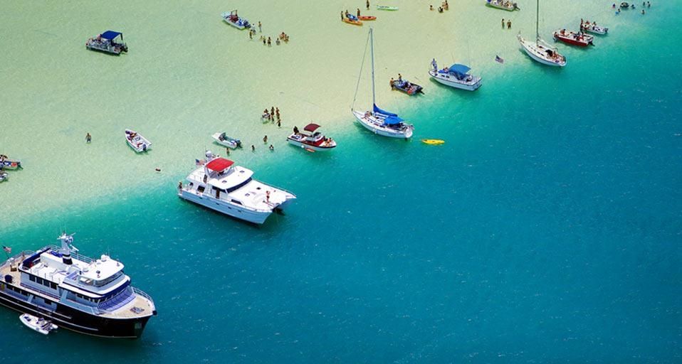 Boats and people on a sandbar, Kaneohe Bay, Oahu, Hawaii