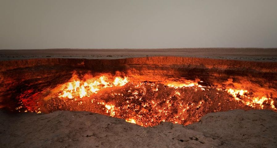 “Gates of Hell” burning fire pit near the village of Darvaza, in the Karakorum Desert, Turkmenistan