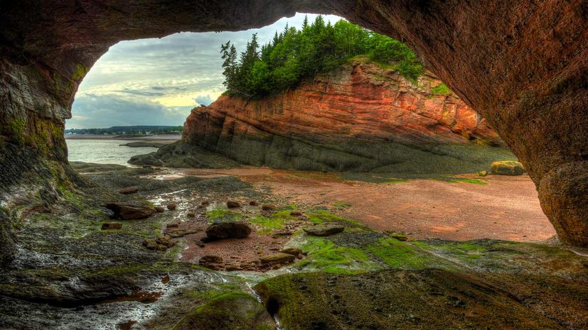 Caves and coastal features at low tide of the Bay of Fundy at St. Martins, New Brunswick, Canada